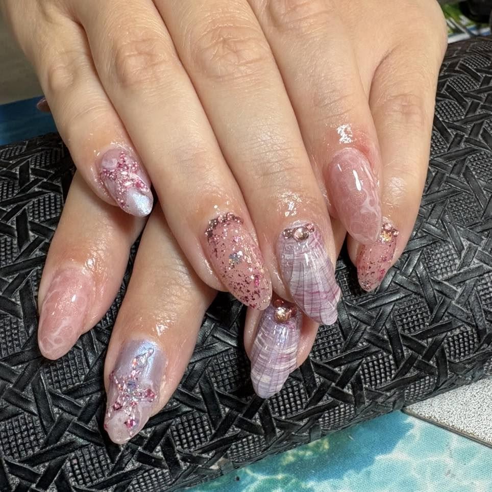 Pink glitter marble gel nails with crystals in Fgura Malta