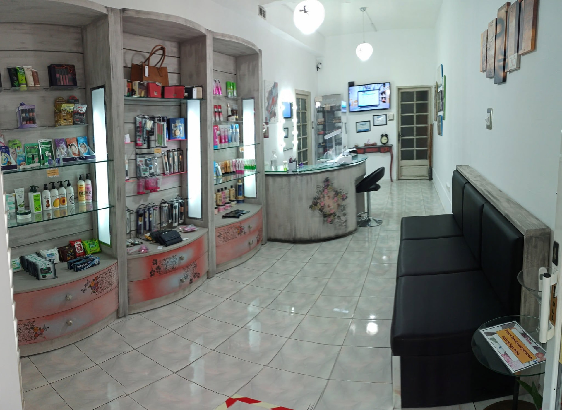 Interior of Ta' Bella Nail Salon in Fgura Malta with beauty product displays and reception